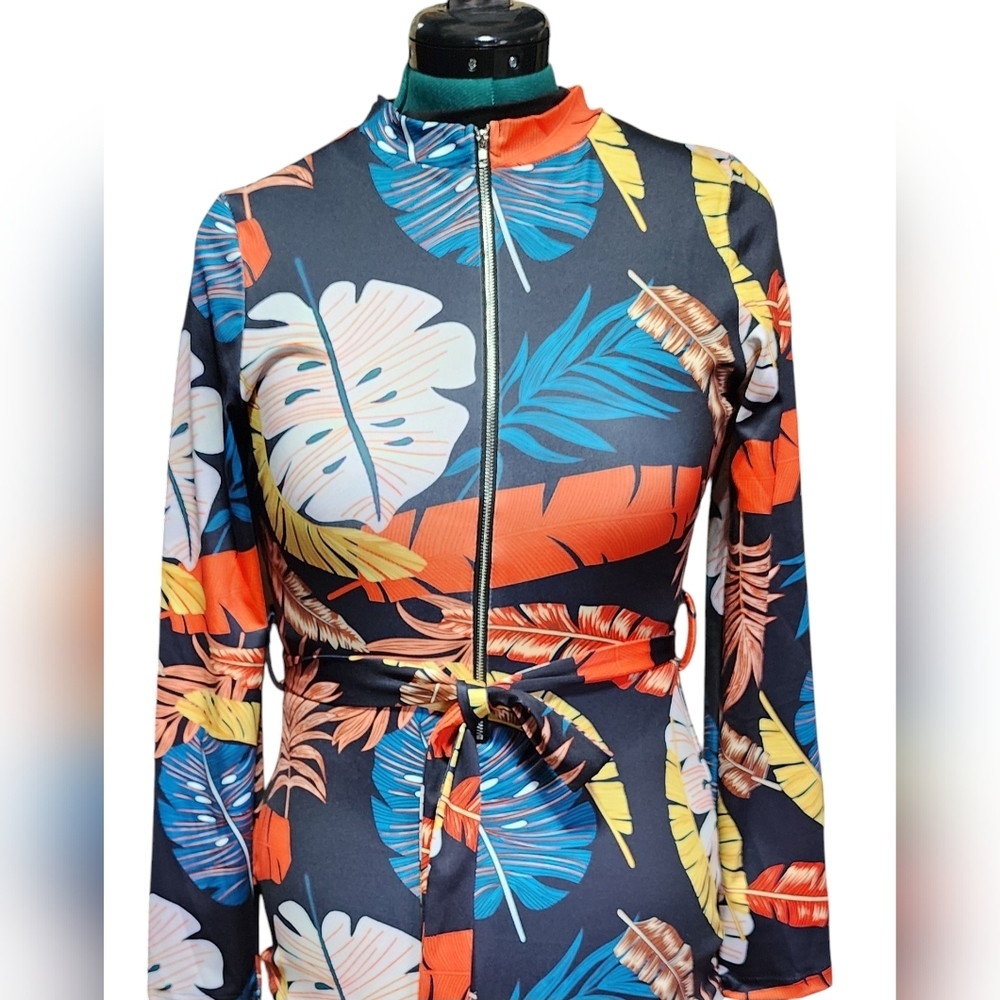 A2: Tropical print, stretchy dress with belt. Zipper in front to waist.